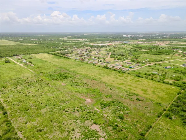 a view of an ocean from a city