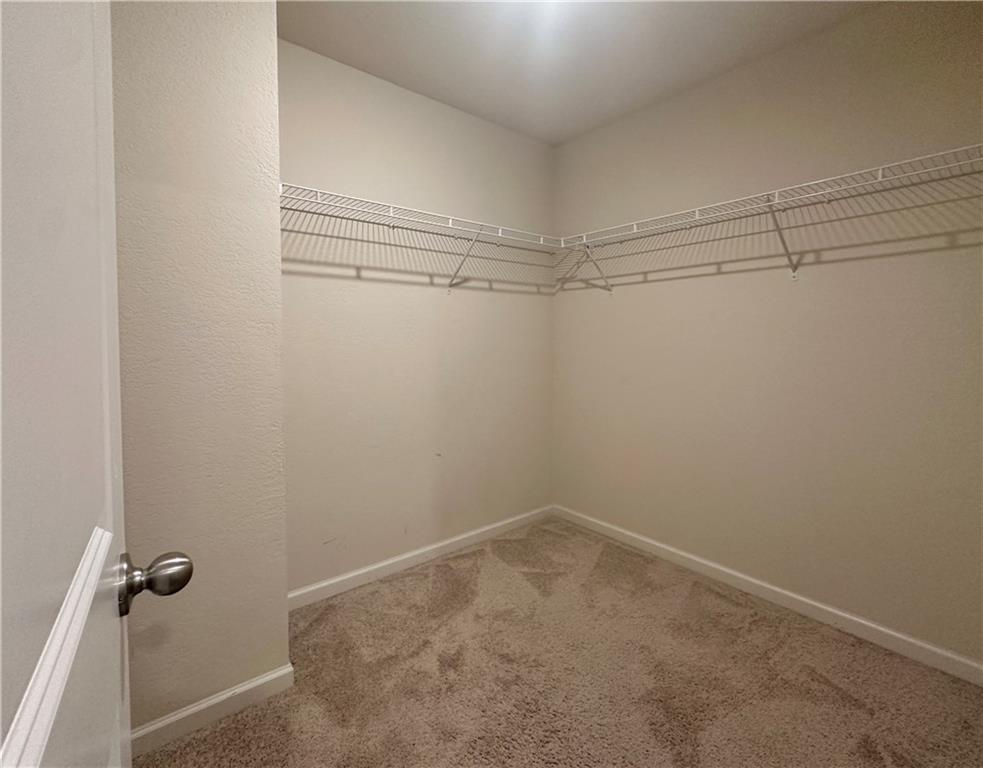 916 Independence Avenue Pendergrass, GA 30567 - Photo 20 of 30 a view of a room with racks on the wall
