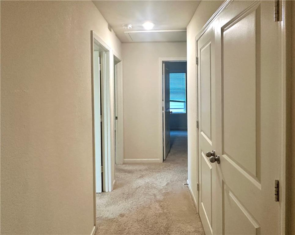 916 Independence Avenue Pendergrass, GA 30567 - Photo 23 of 30 a view of a hallway with wooden floor