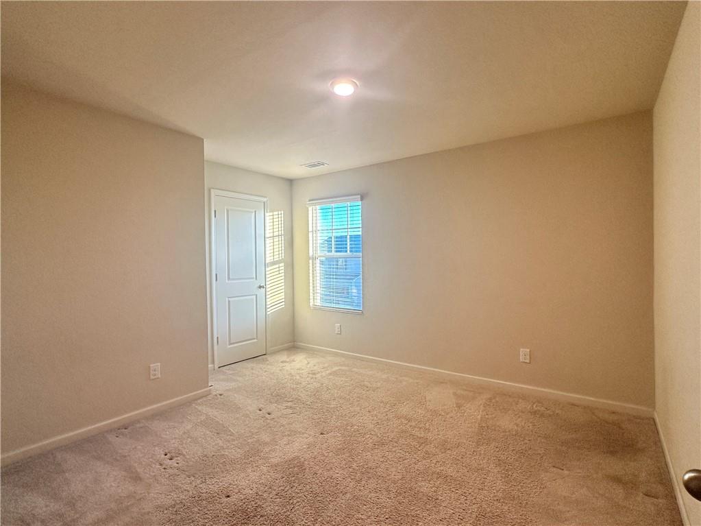 916 Independence Avenue Pendergrass, GA 30567 - Photo 26 of 30 an empty room with windows