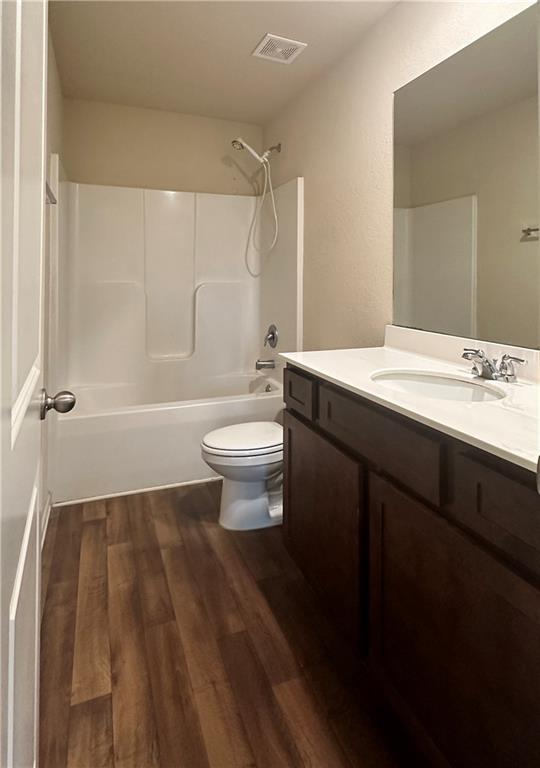 916 Independence Avenue Pendergrass, GA 30567 - Photo 28 of 30 a bathroom with a sink a toilet a mirror and shower