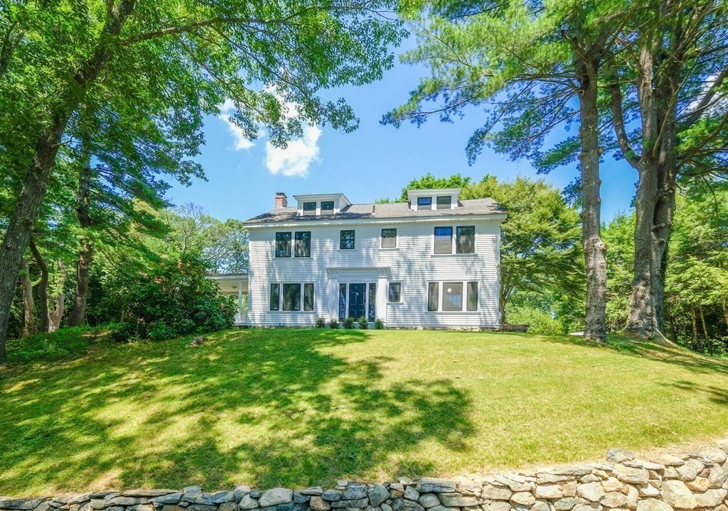 270 Concord Road Wayland, MA 01778 - Photo 1 of 9 a view of a house with a garden