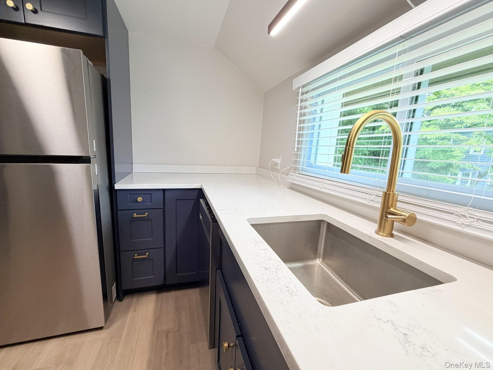 4 Lower Trinity Pass Road Pound Ridge, NY 10576 - Photo 18 of 29 a kitchen with a refrigerator and a sink