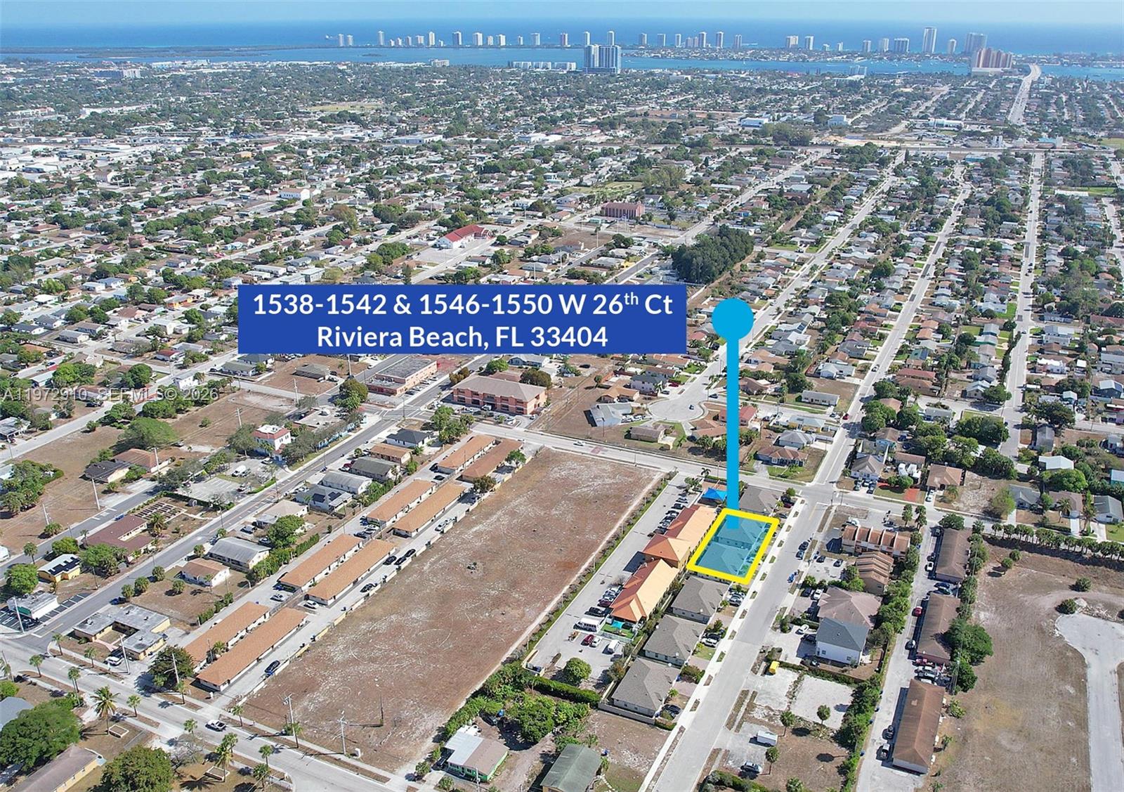 1546 West 26th Court Riviera Beach, FL 33404 - Photo 10 of 13 an aerial view of residential houses with outdoor space