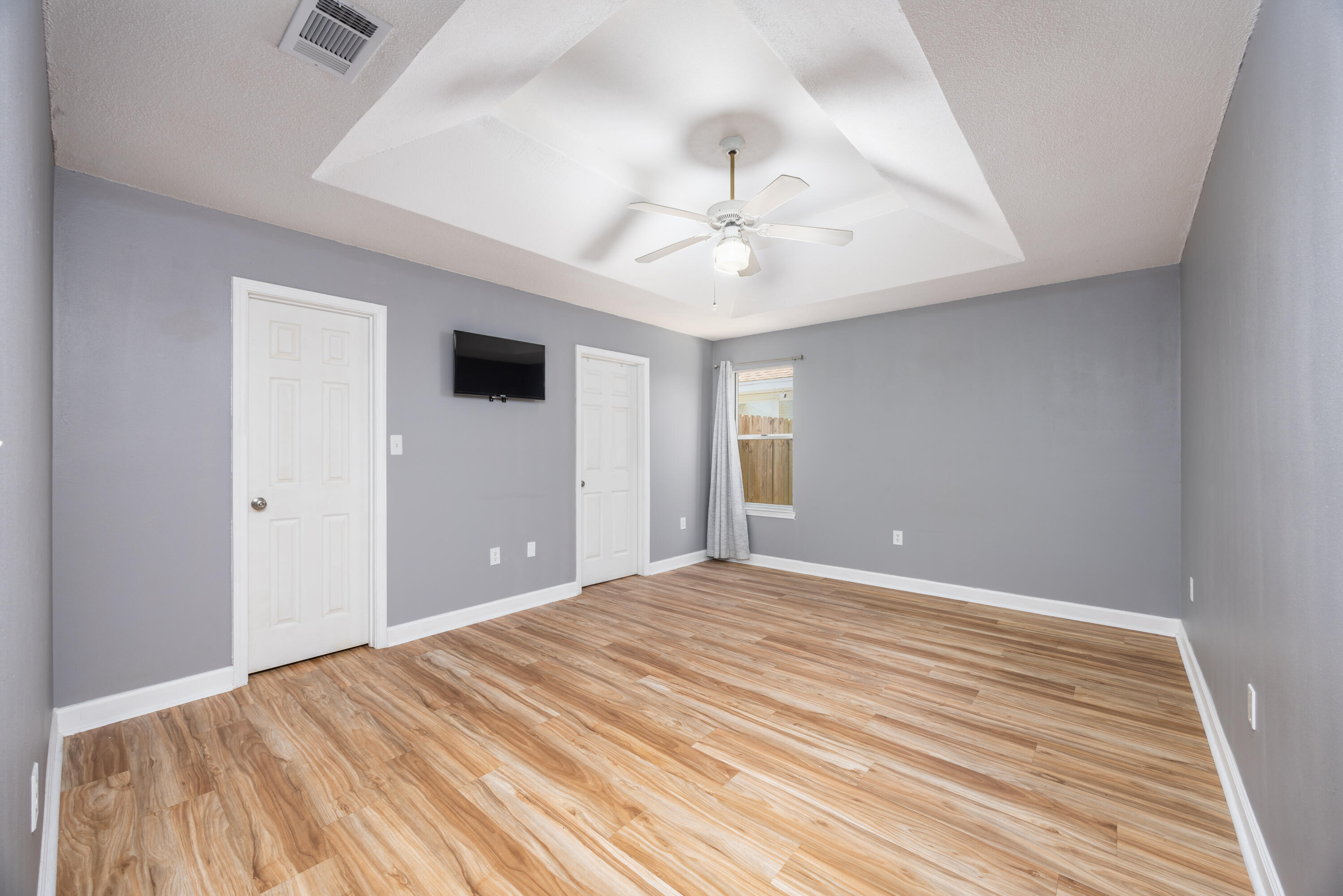 39 Pine Ridge Trace Destin, FL 32541 - Photo 13 of 42 a view of an empty room with a chandelier