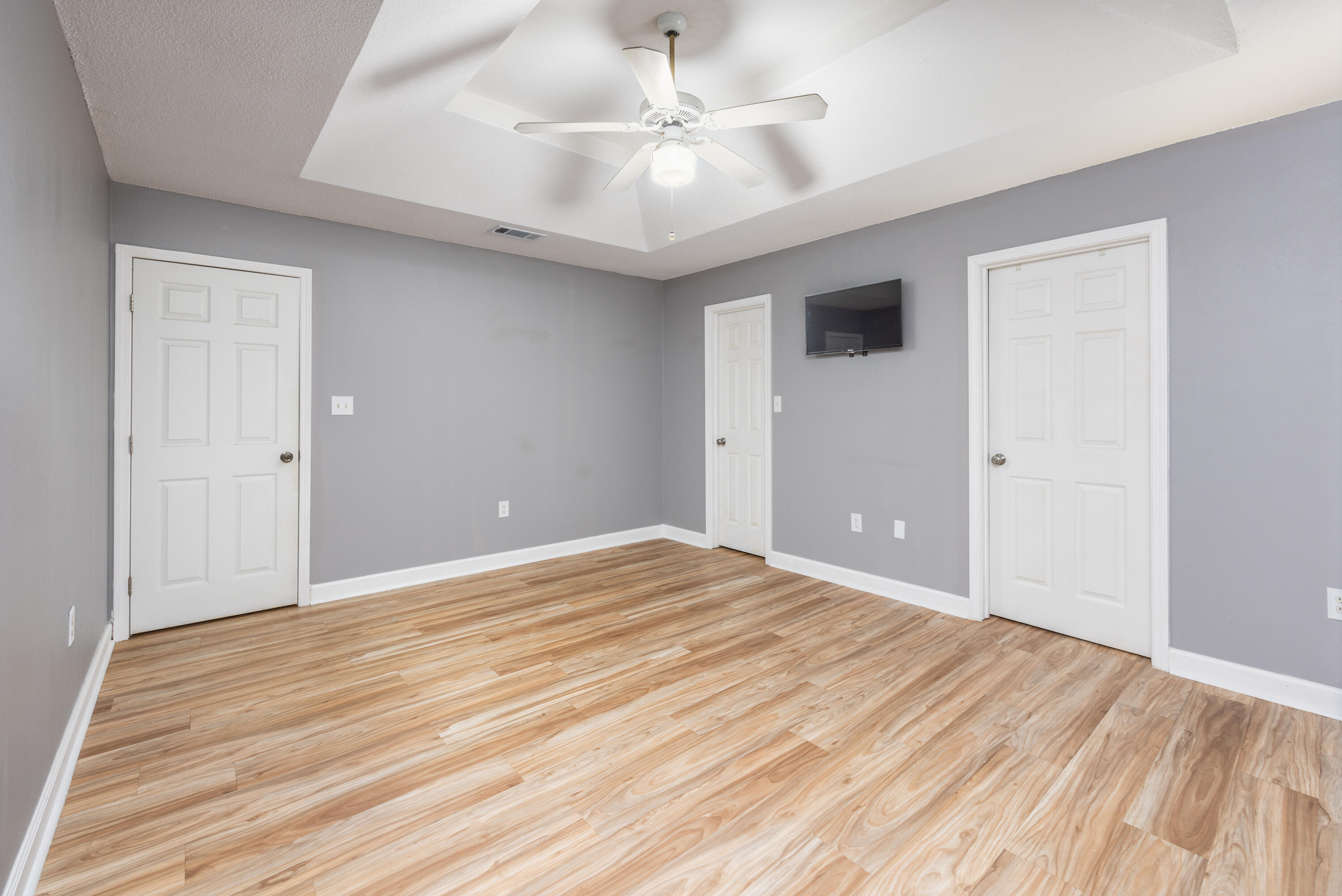 39 Pine Ridge Trace Destin, FL 32541 - Photo 14 of 42 a view of empty room with wooden floor