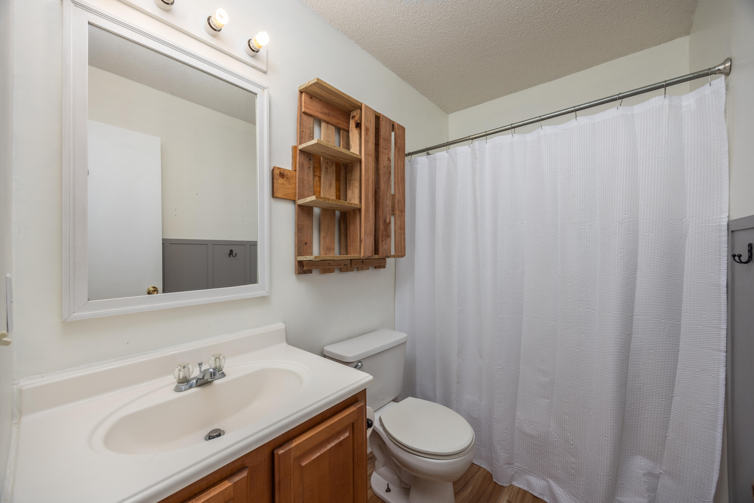 39 Pine Ridge Trace Destin, FL 32541 - Photo 20 of 42 a bathroom with a sink and a mirror