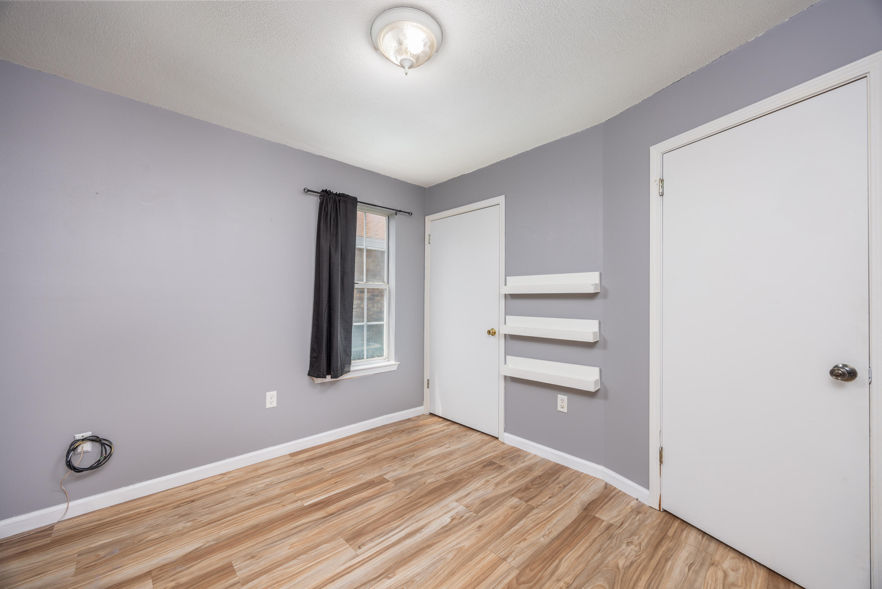 39 Pine Ridge Trace Destin, FL 32541 - Photo 23 of 42 a view of a room with a closet and cabinet