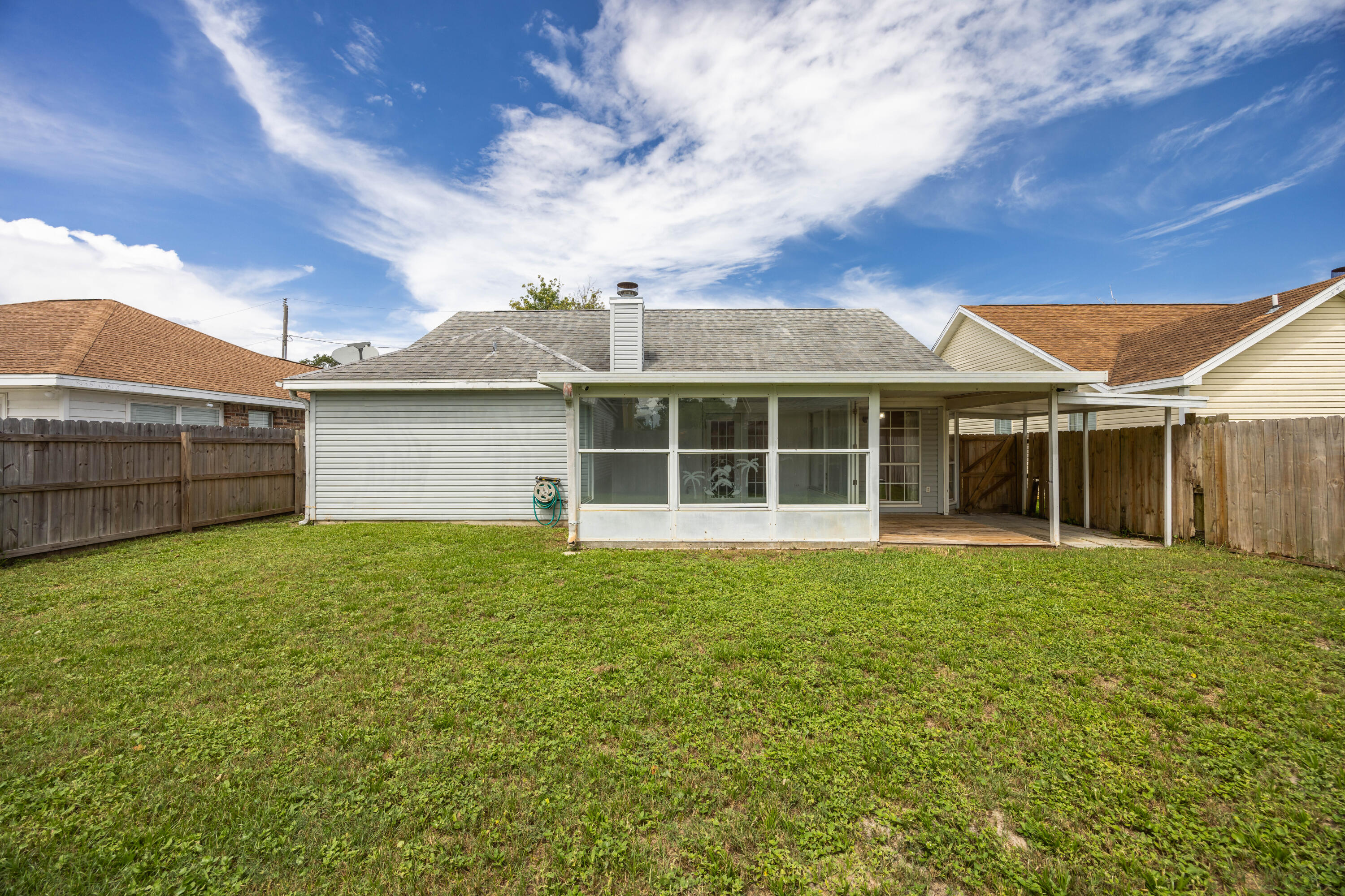 39 Pine Ridge Trace Destin, FL 32541 - Photo 30 of 42 a view of a house with a garden