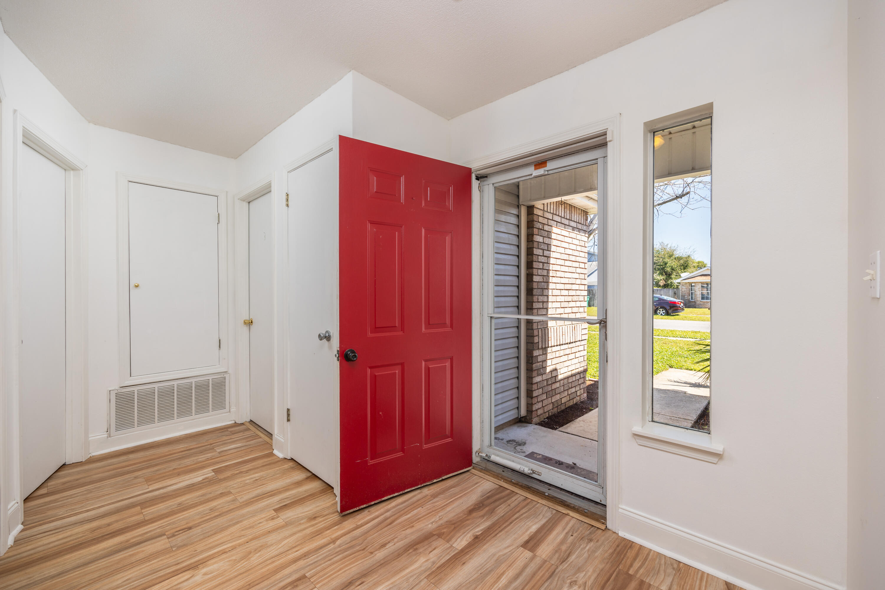 39 Pine Ridge Trace Destin, FL 32541 - Photo 3 of 42 a view of an entryway with wooden floor