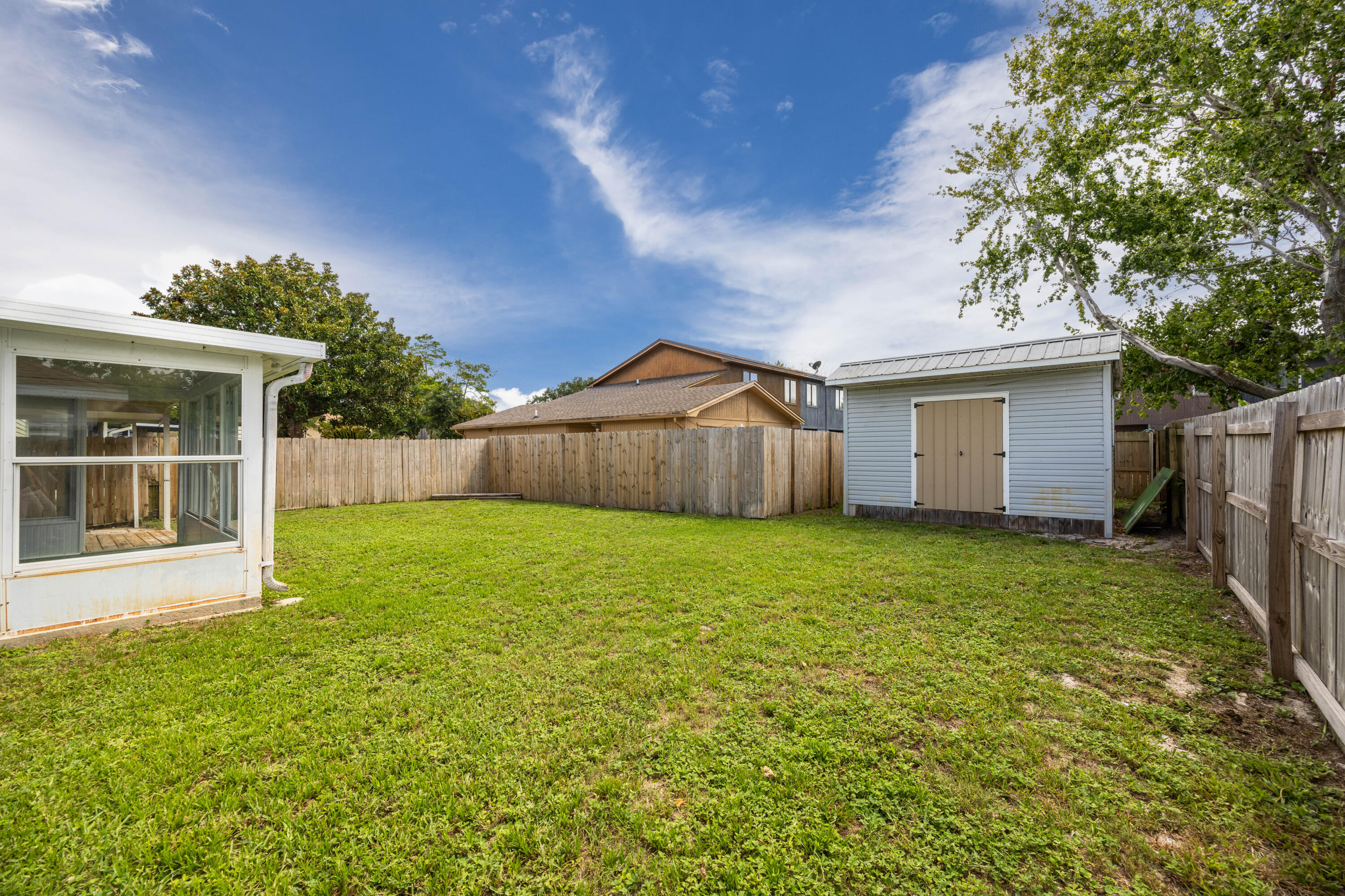 39 Pine Ridge Trace Destin, FL 32541 - Photo 31 of 42 a view of a house with backyard and garden