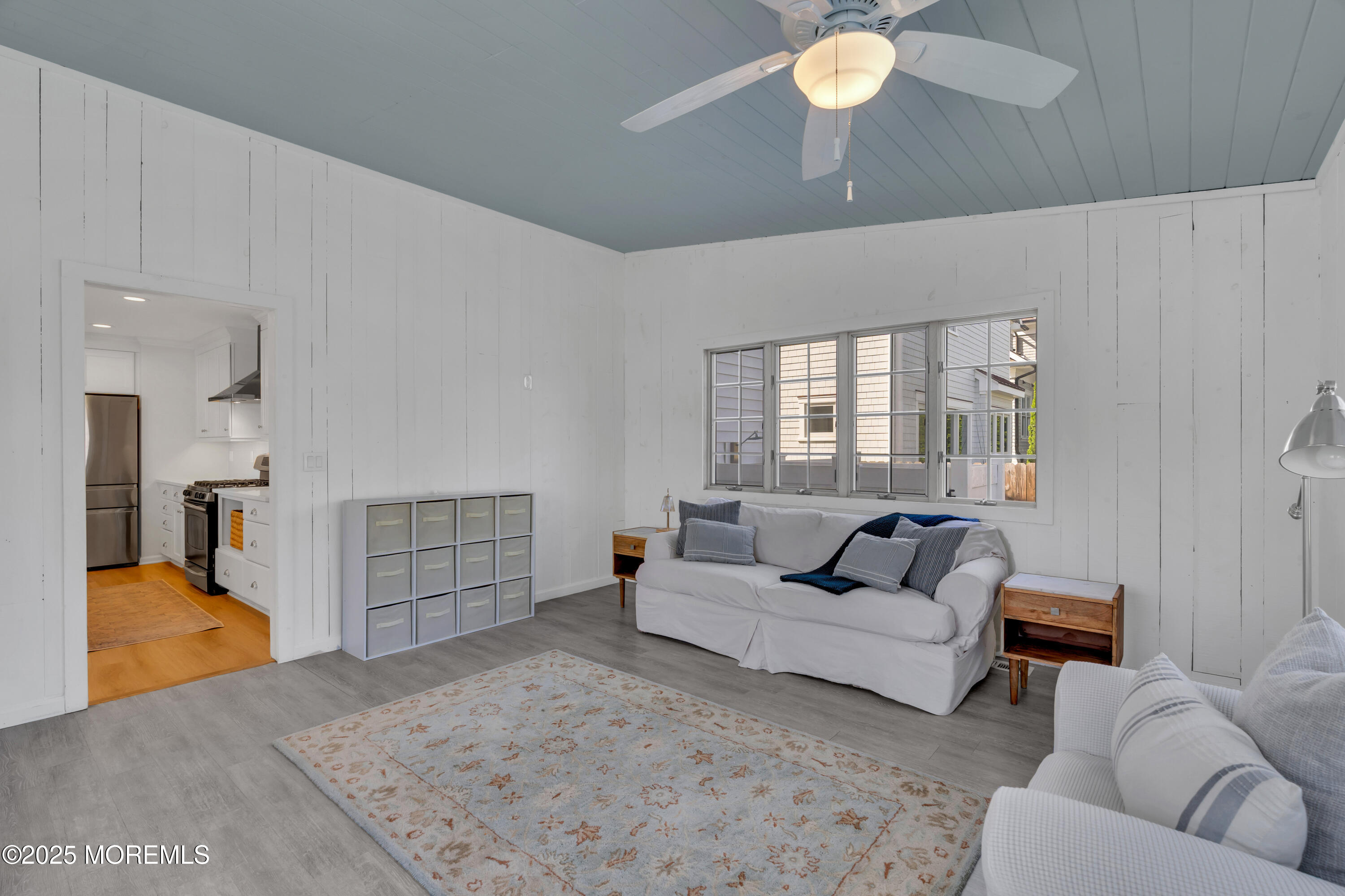 312 Woodland Road Point Pleasant Beach, NJ 08742 - Photo 13 of 52 a living room with furniture and a large window