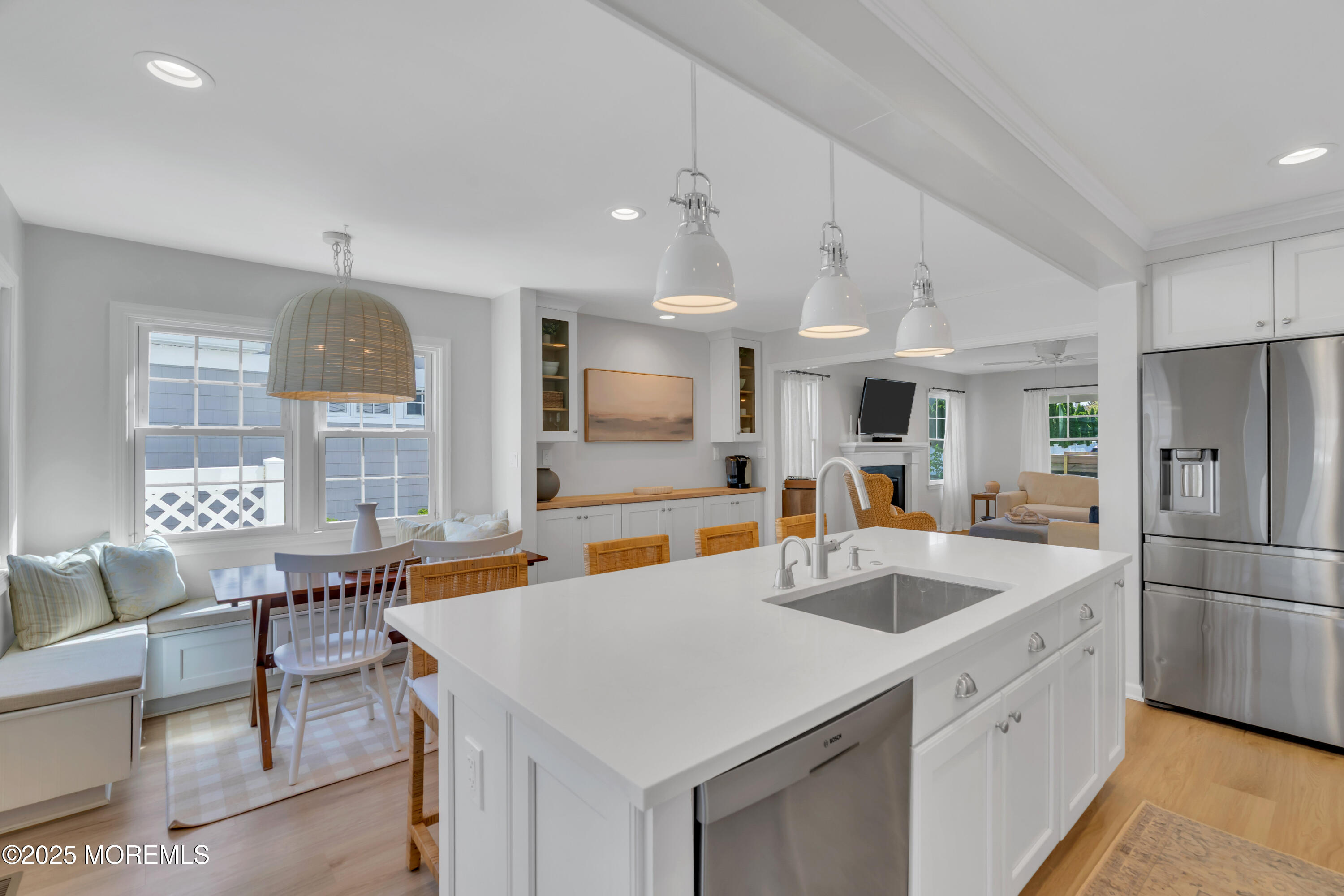 312 Woodland Road Point Pleasant Beach, NJ 08742 - Photo 13 of 52 a kitchen with stainless steel appliances granite countertop a sink refrigerator and cabinets
