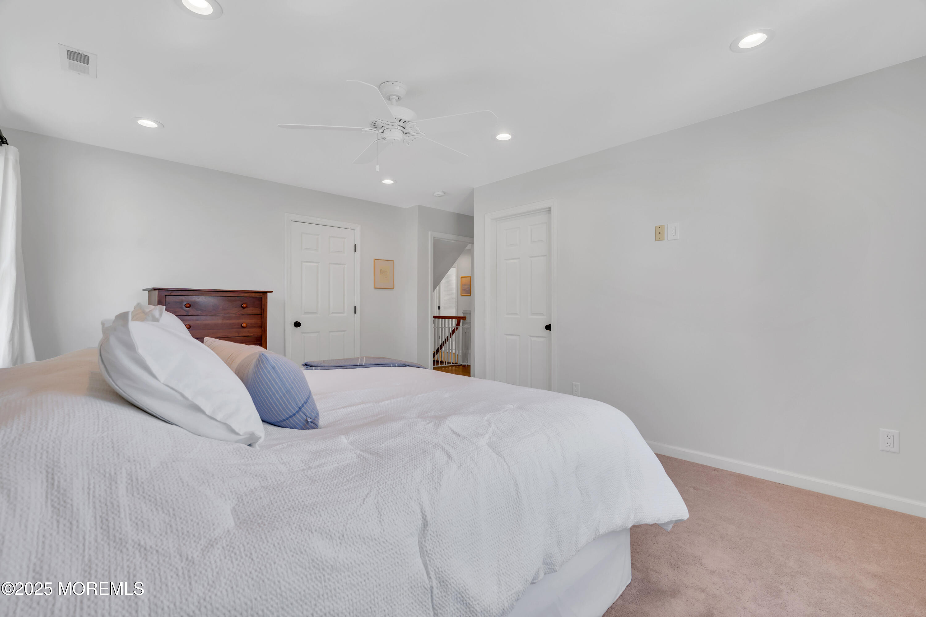 312 Woodland Road Point Pleasant Beach, NJ 08742 - Photo 25 of 52 a bedroom with a bed and a painting
