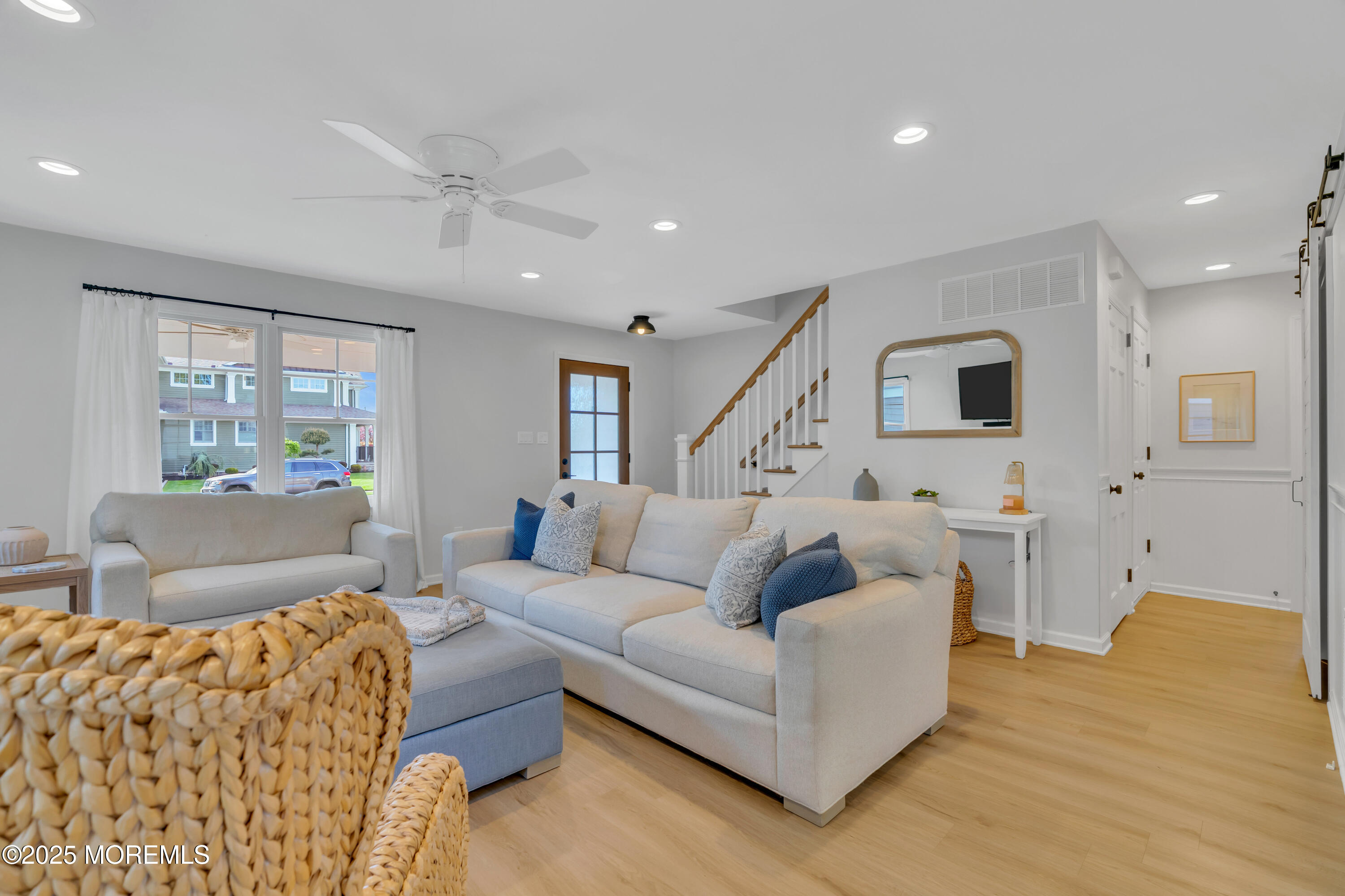 312 Woodland Road Point Pleasant Beach, NJ 08742 - Photo 8 of 52 a living room with furniture and a large window