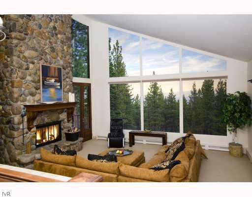 950 Apollo Way Incline Village, NV 89451 - Photo 2 of 7 Living Room. TWO SIDED fireplace, Doors to huge de