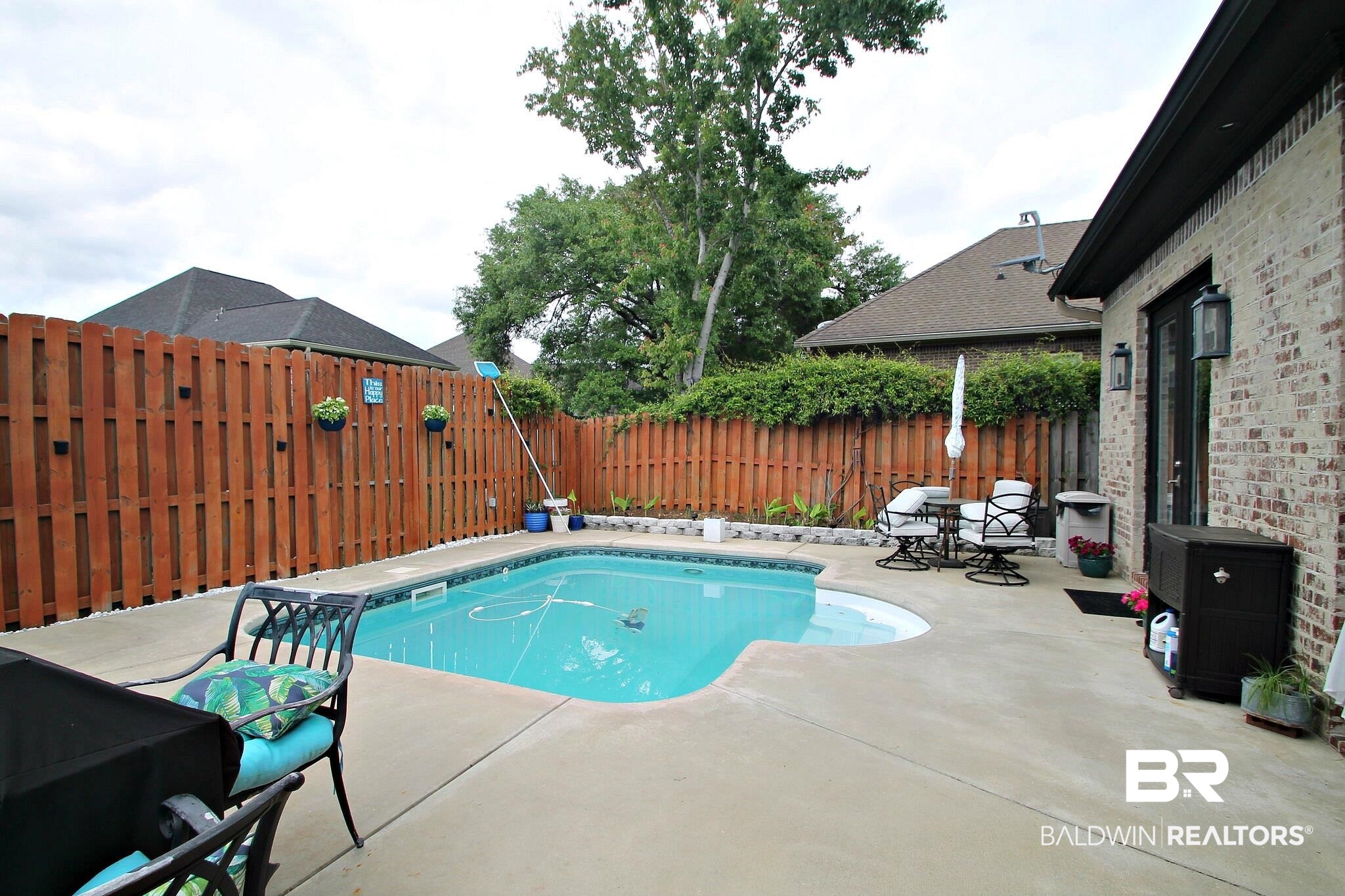 3415 Rue Royal Mobile, AL 36693 - Photo 26 of 31 View of swimming pool with a fenced backyard, a patio area, and a fenced in pool