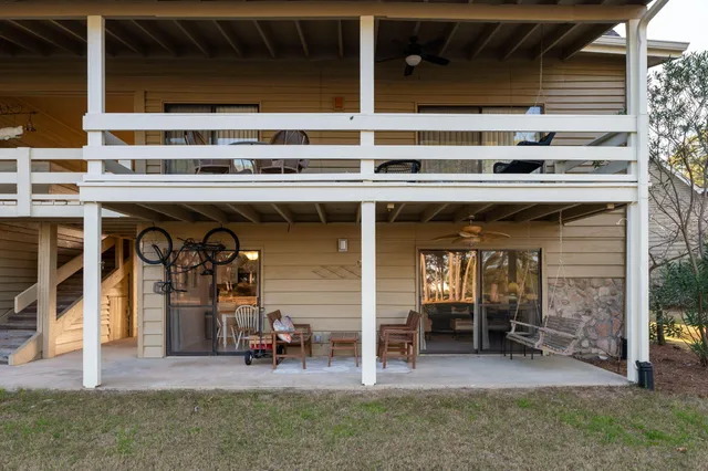 a view of house with outdoor space and swimming pool