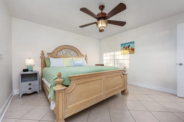 a bathroom with a toilet sink and shower