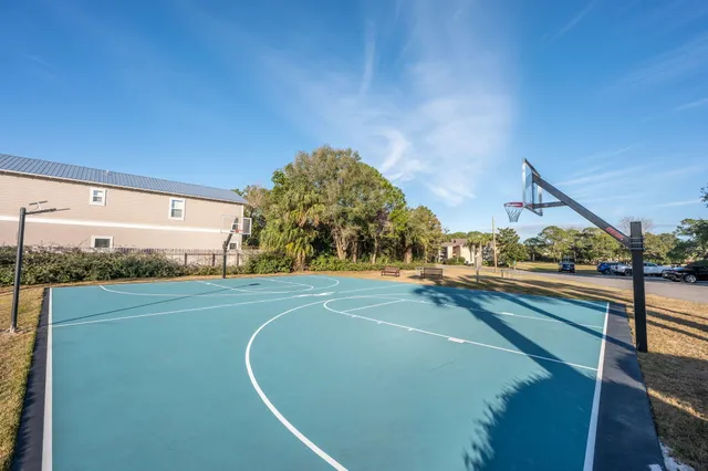a view of a swimming pool with a lounge chairs