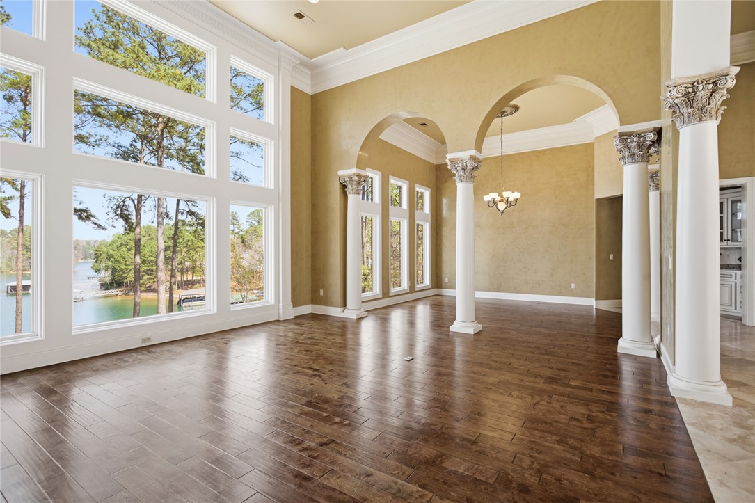 610 Highridge Drive Seneca, SC 29672 - Photo 7 of 50 This grand living space features expansive Lake Keowee views and architectural columns.