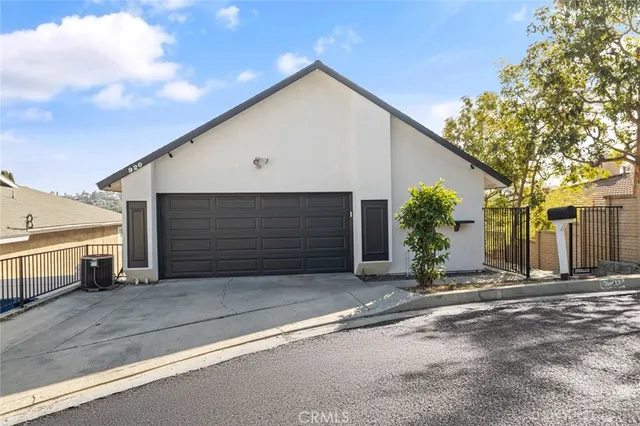 a view of a house with a garage