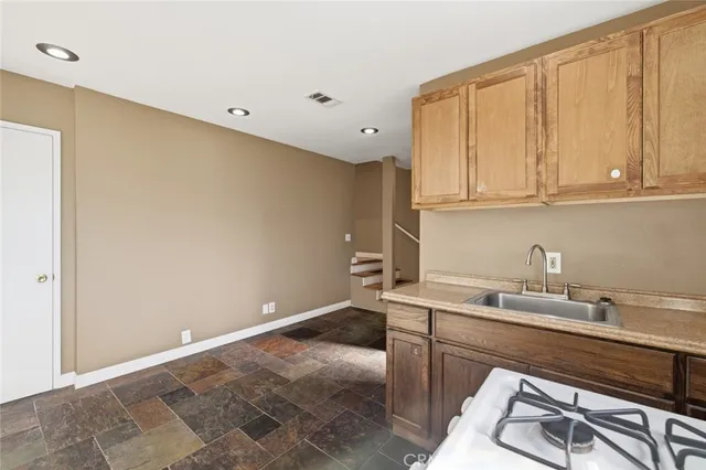 a view of a balcony with wooden floor