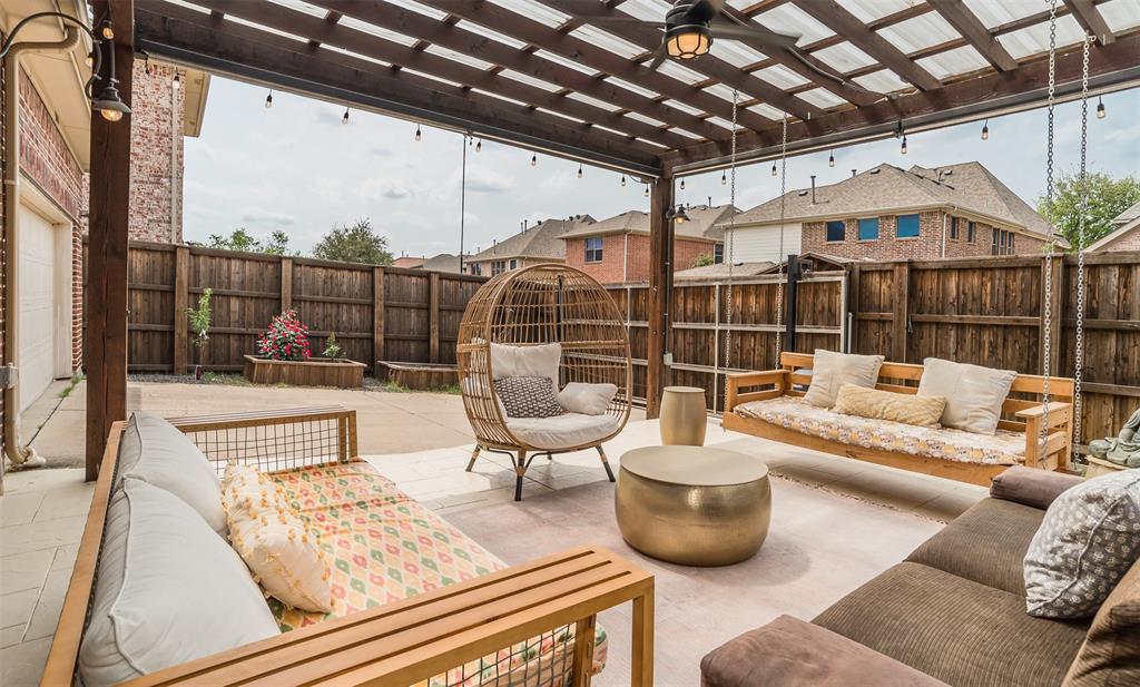 8631 Lohr Valley Road Irving, TX 75063 - Photo 27 of 32 Fenced backyard with an outdoor lounge area, a ceiling fan, and a patio area