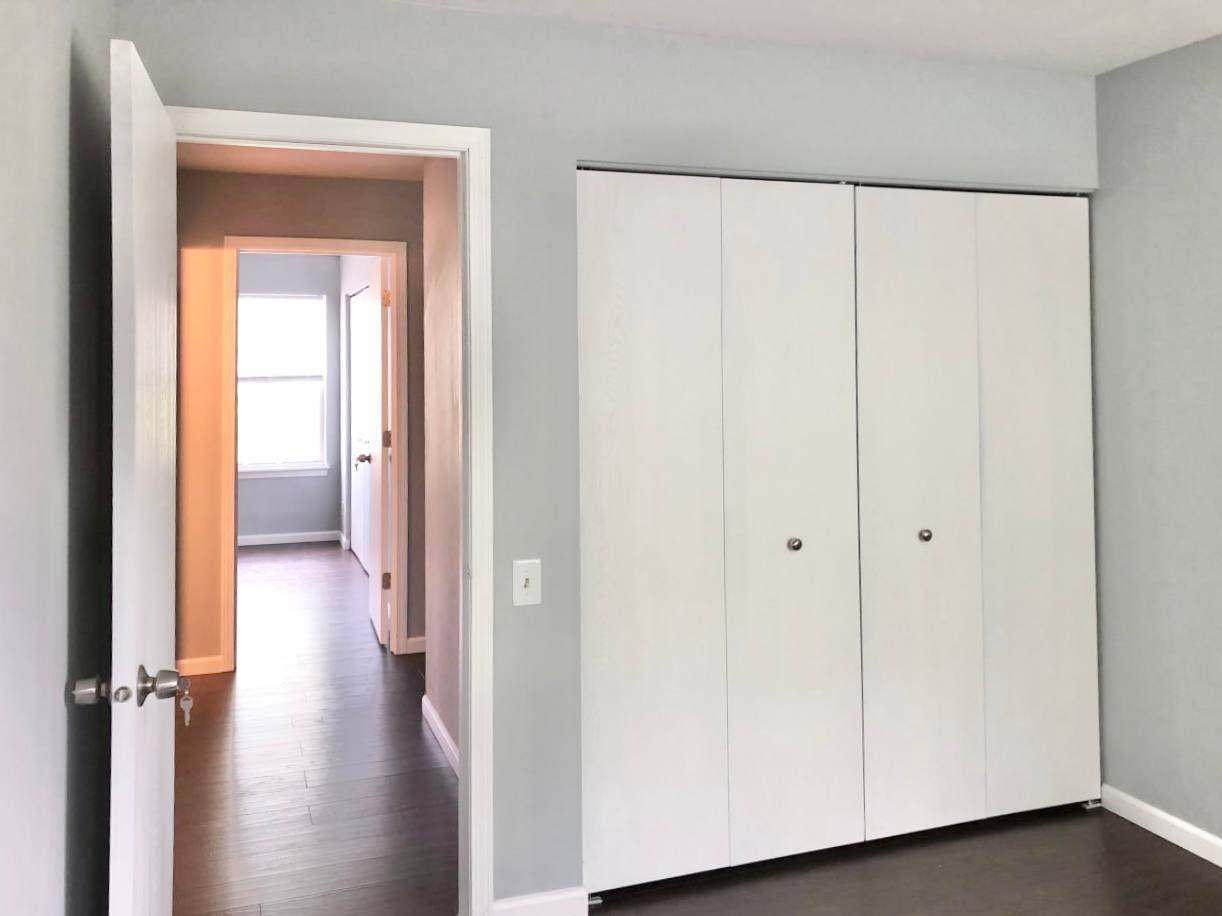 278 Half Moon Circle Aurora, IL 60504 - Photo 14 of 19 a view of a hallway with wooden floor