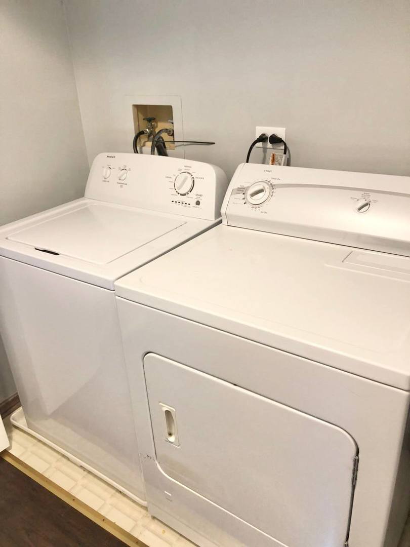 278 Half Moon Circle Aurora, IL 60504 - Photo 16 of 19 a utility room with dryer and washer