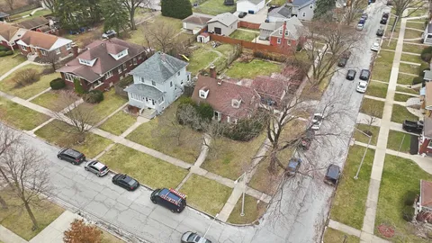 a view of residential houses with outdoor space