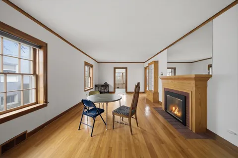 a view of a livingroom with furniture and a fireplace