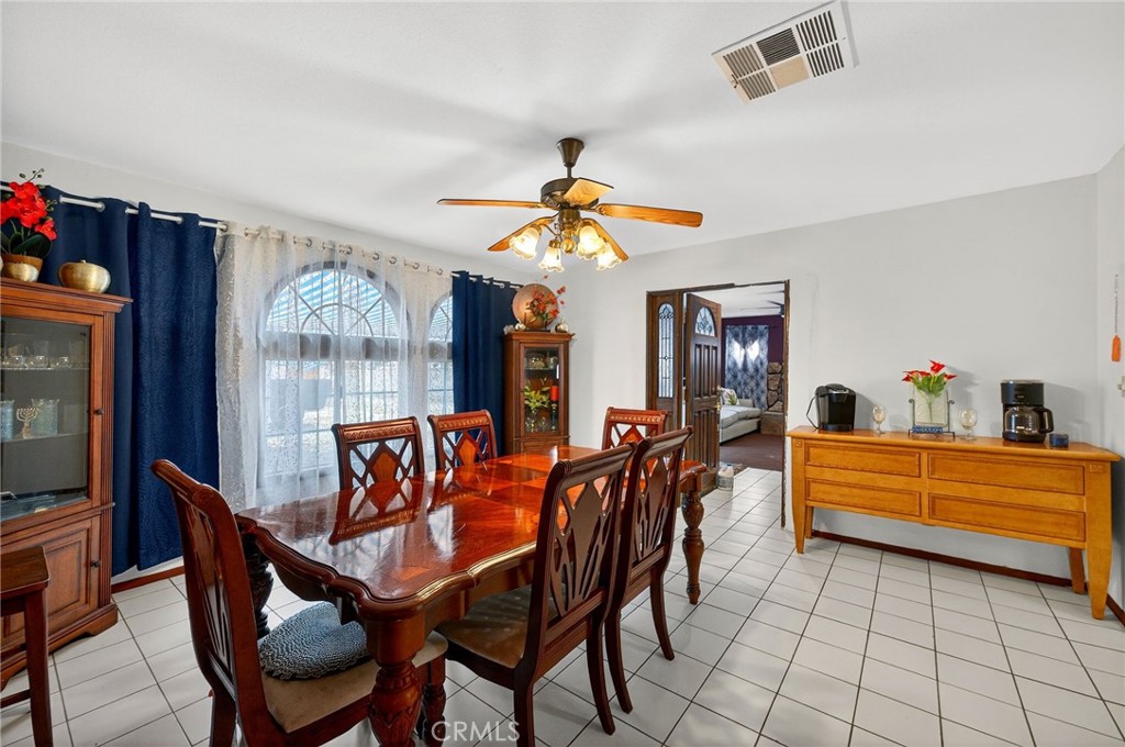 4153 North Webster Avenue Perris, CA 92571 - Photo 14 of 49 a dining room with furniture and window