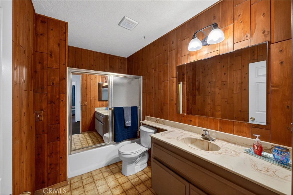 4153 North Webster Avenue Perris, CA 92571 - Photo 22 of 49 a bathroom with a sink a toilet and shower