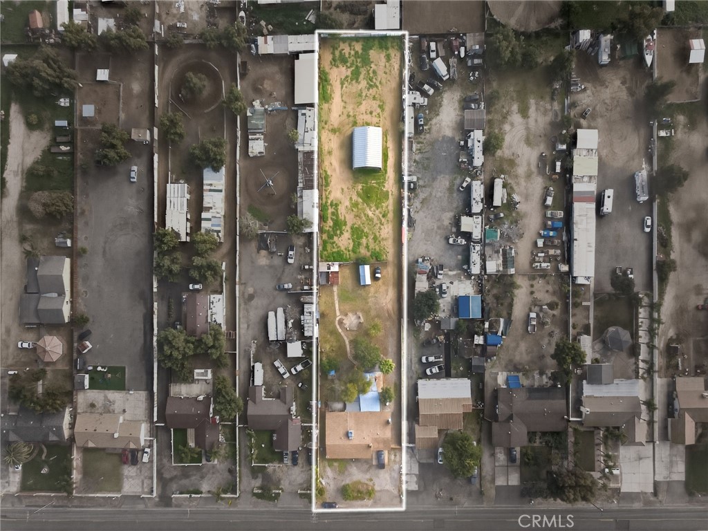 4153 North Webster Avenue Perris, CA 92571 - Photo 3 of 49 a view of a bathroom that has a glass door