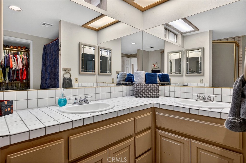 4153 North Webster Avenue Perris, CA 92571 - Photo 31 of 49 a kitchen with a sink and a window