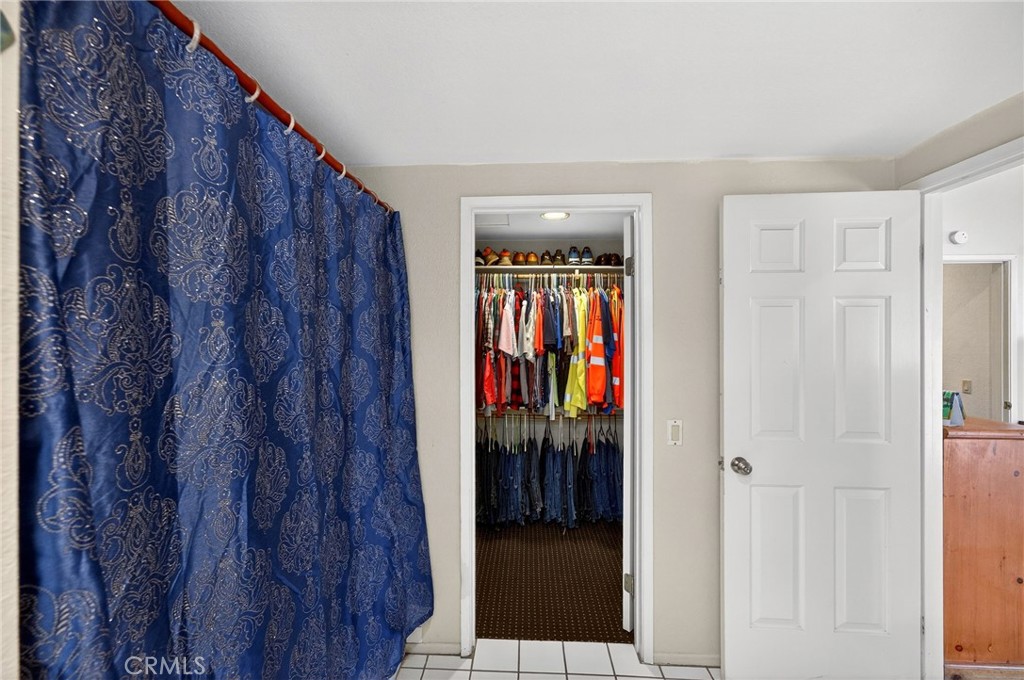 4153 North Webster Avenue Perris, CA 92571 - Photo 32 of 49 a view of walk in closet