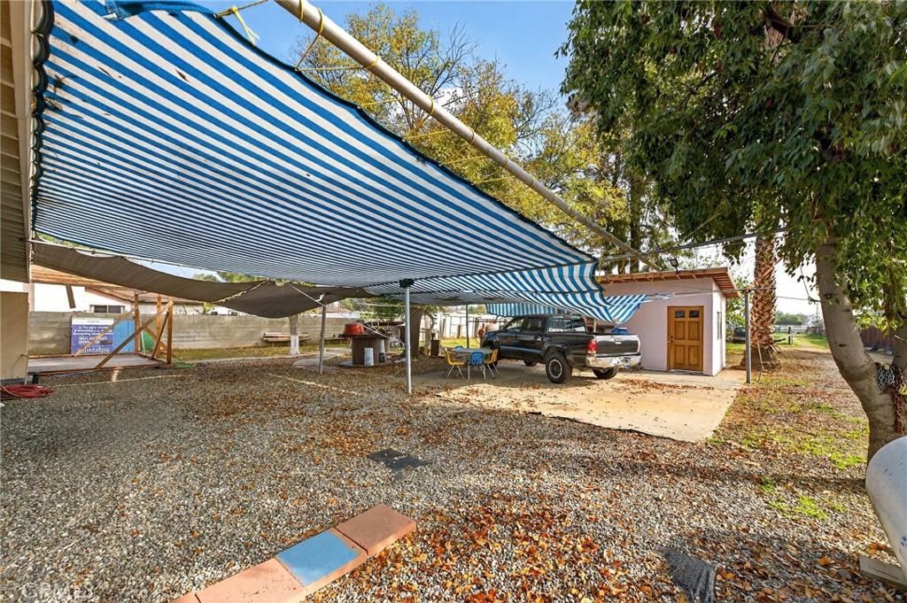 4153 North Webster Avenue Perris, CA 92571 - Photo 33 of 49 a view of a house with a patio