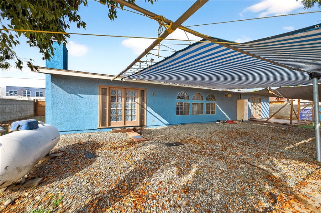 4153 North Webster Avenue Perris, CA 92571 - Photo 34 of 49 a front view of a house with a yard