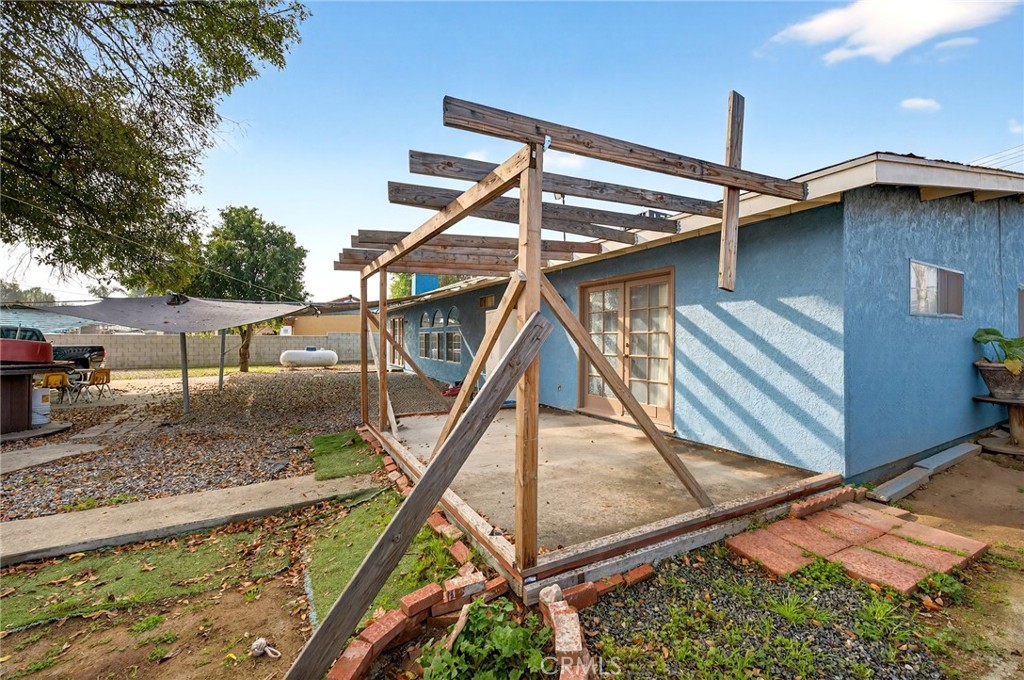 4153 North Webster Avenue Perris, CA 92571 - Photo 38 of 49 a house view with a backyard space