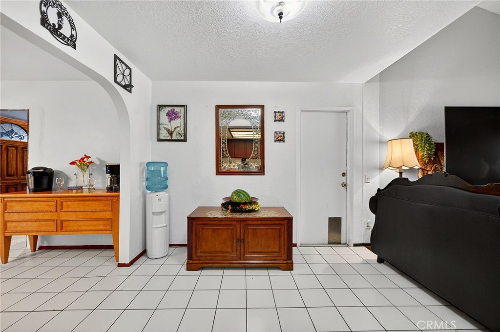 4153 North Webster Avenue Perris, CA 92571 - Photo 7 of 49 a bedroom with furniture and window