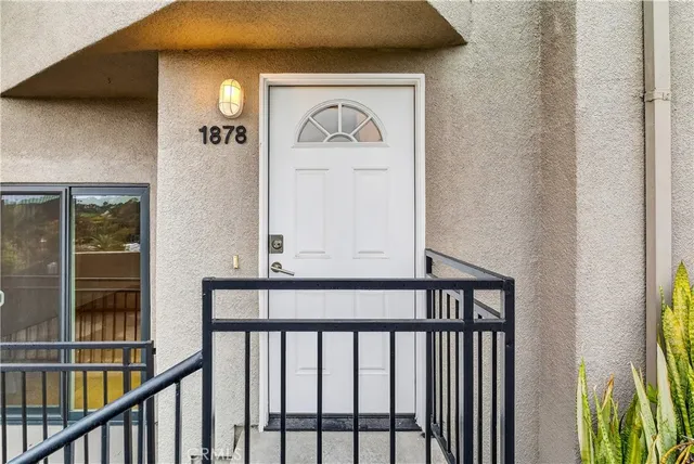 a view of entryway with a front door