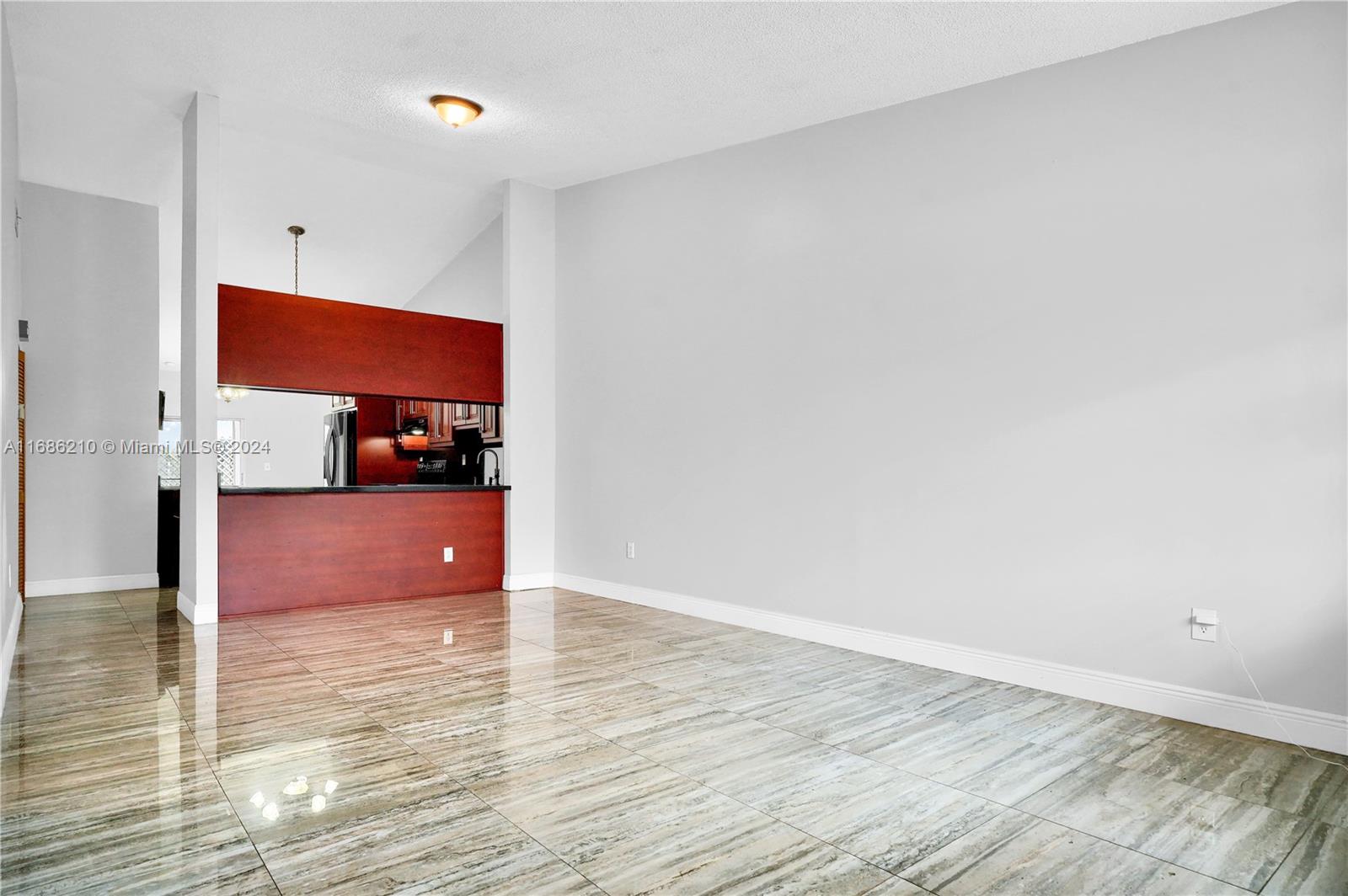 7462 West 29th Way Hialeah, FL 33018 - Photo 5 of 13 a view of room with wooden floor