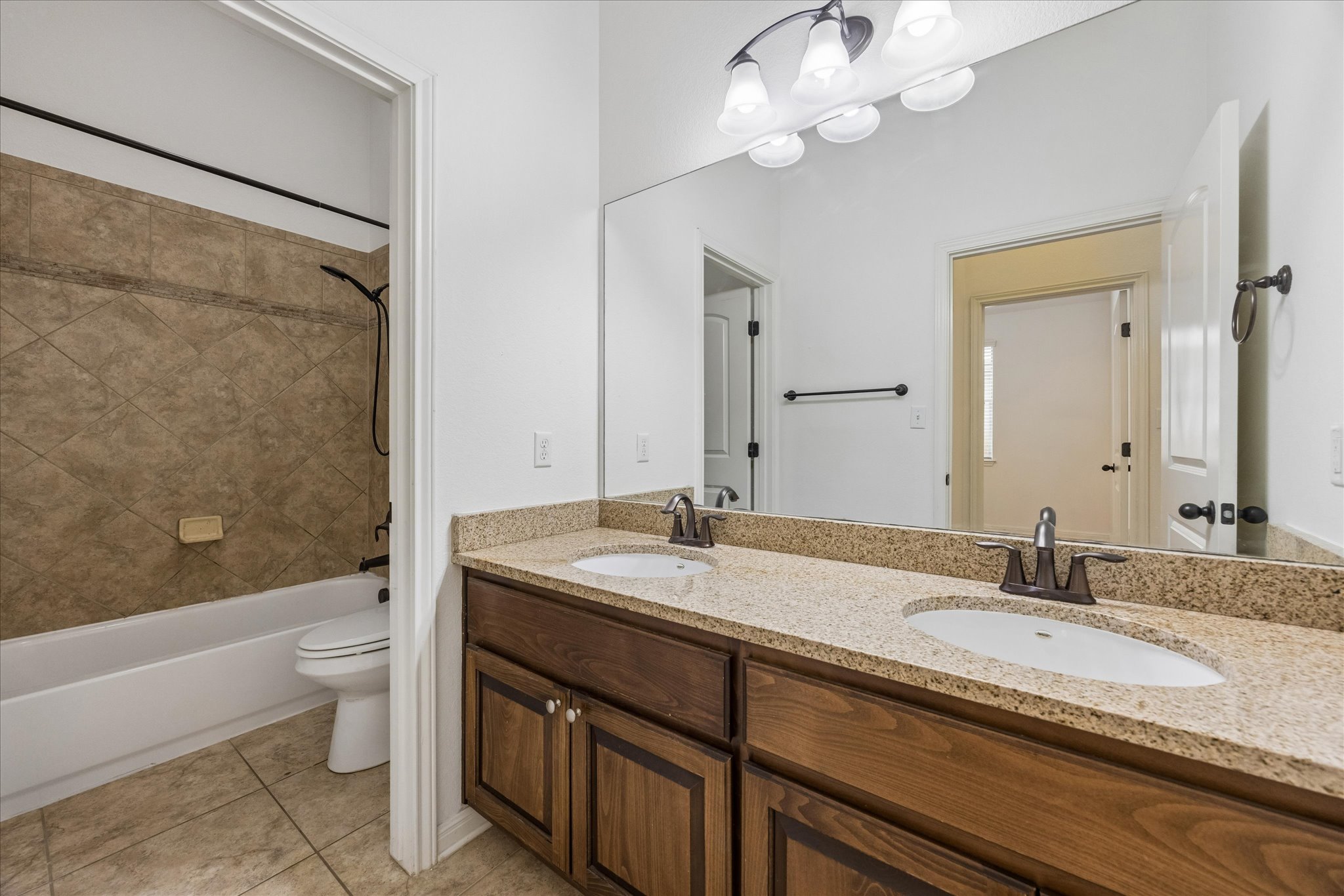 14304 Senia Bend Austin, TX 78738 - Photo 14 of 15 Secondary bath with dual vanities