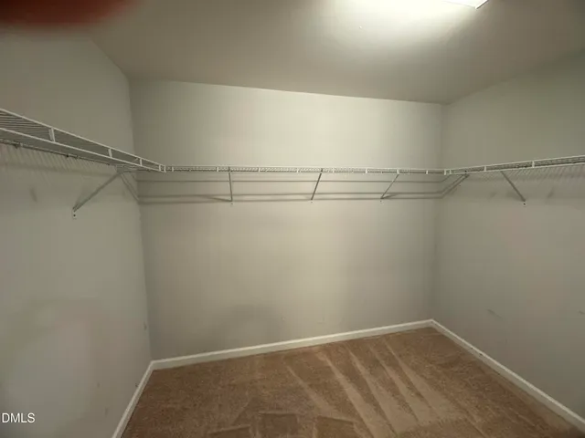 a view of a porch with wooden floor and outdoor space