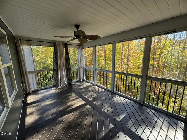 a view of living room with furniture and window
