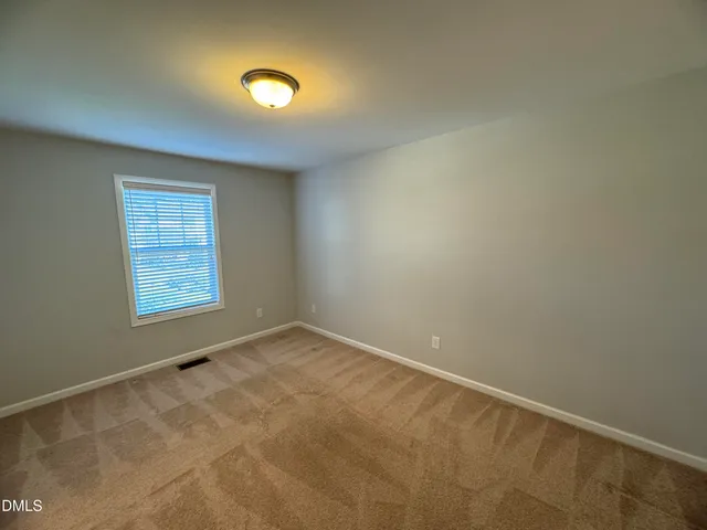 a bathroom with a double vanity sink toilet and shower