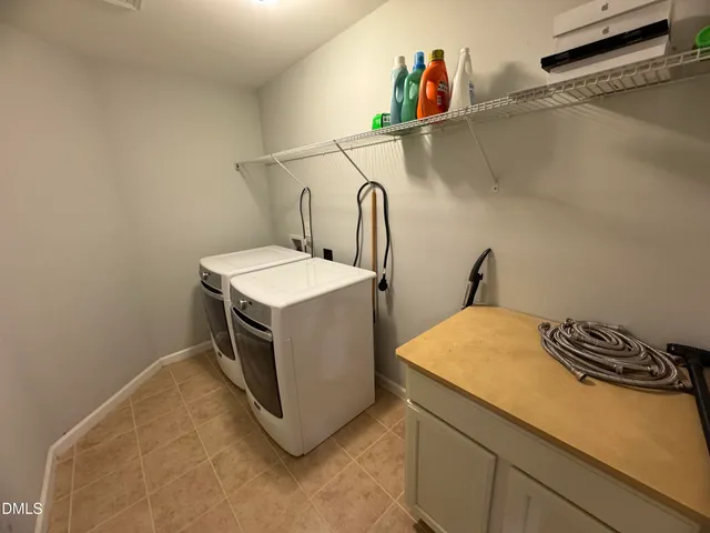 a balcony view with a seating space