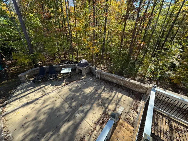 a view of balcony with furniture