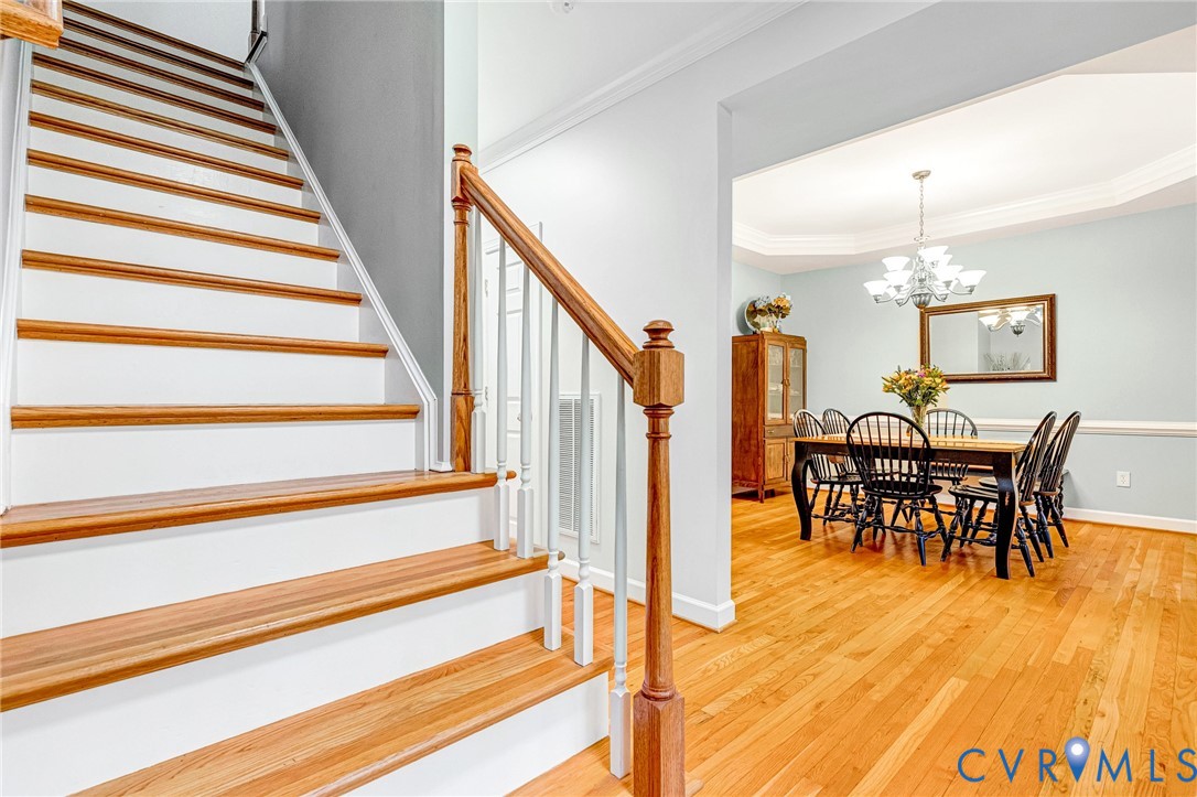 14436 Overlook Ridge Lane Beaverdam, VA 23015 - Photo 21 of 82 a view of a dining room with furniture and wooden floor